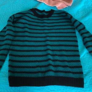 green and black striped sweater